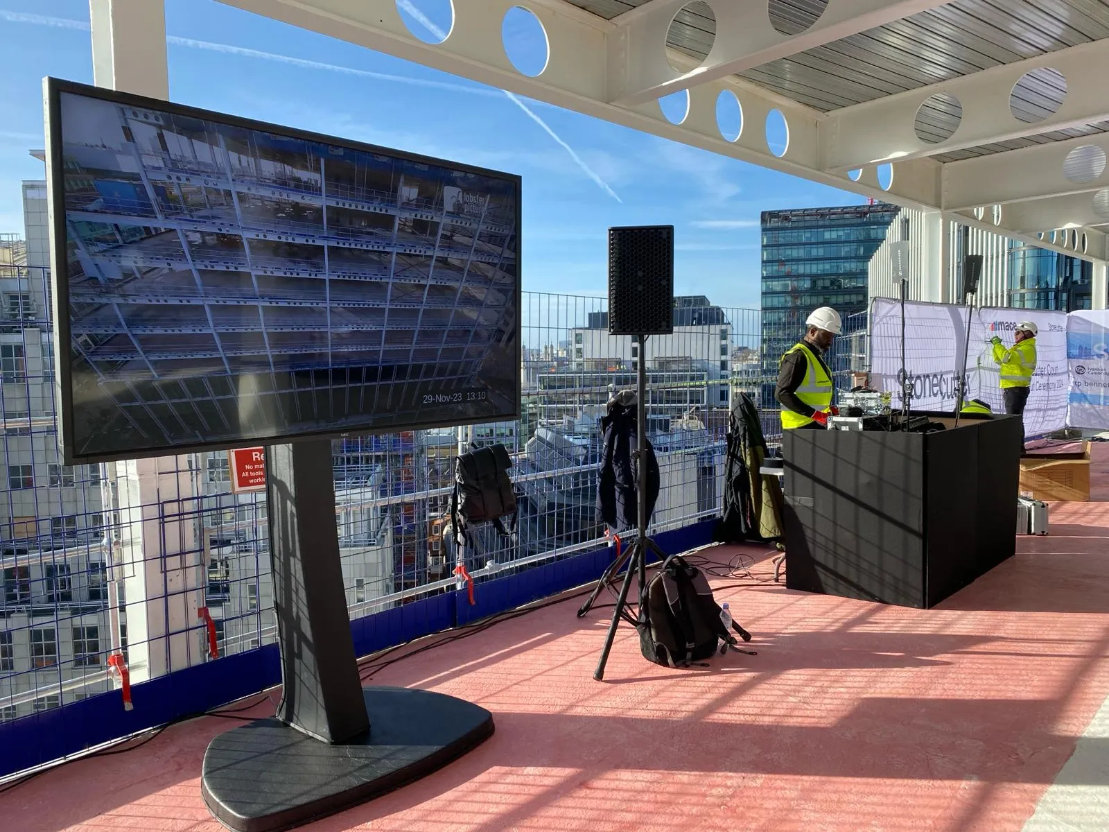 Rooftop display screen at Mace Stonecutter Court topping-out ceremony