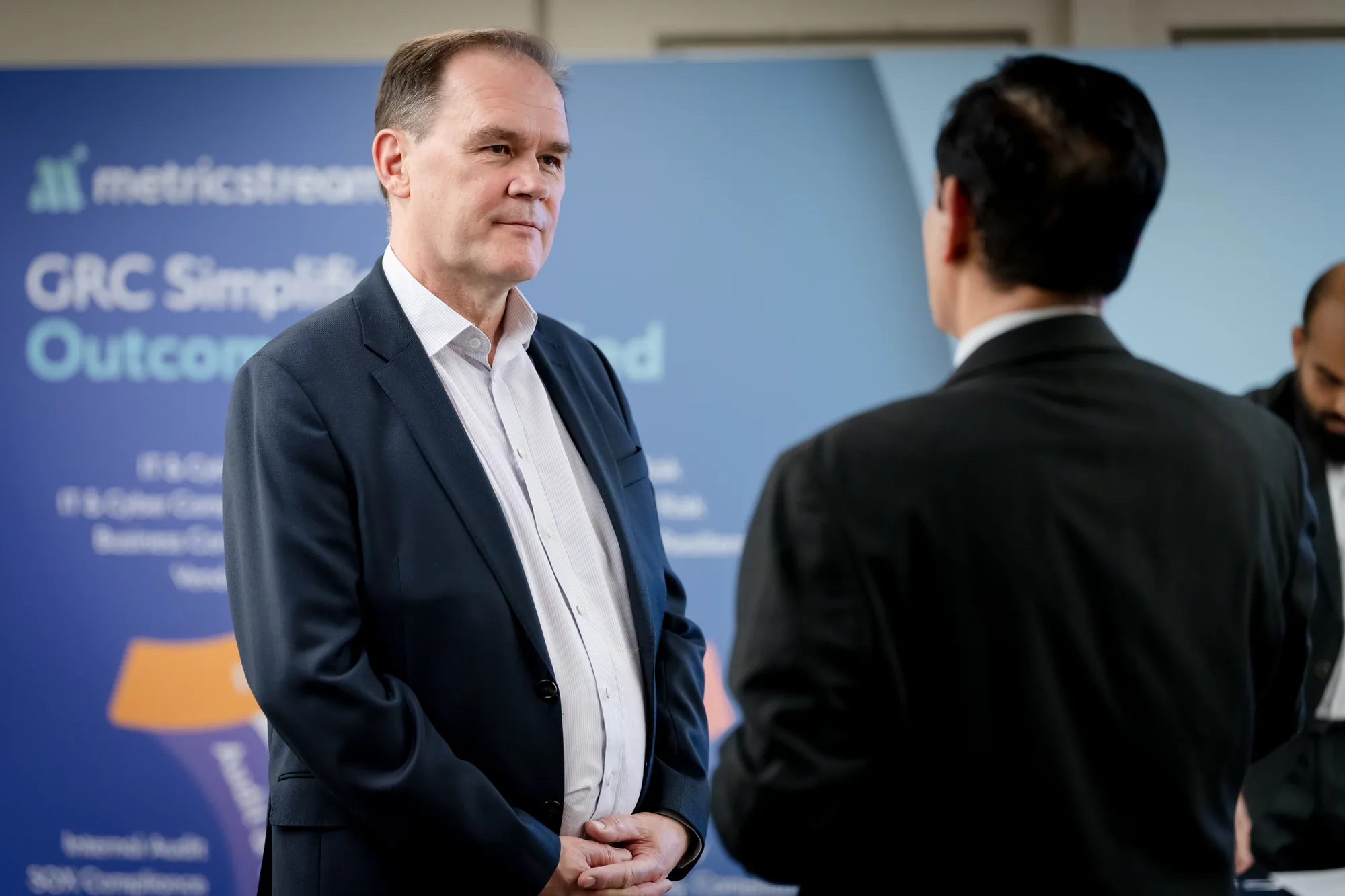 breakout-session-branded-backdrop-grc-summit-london-2026