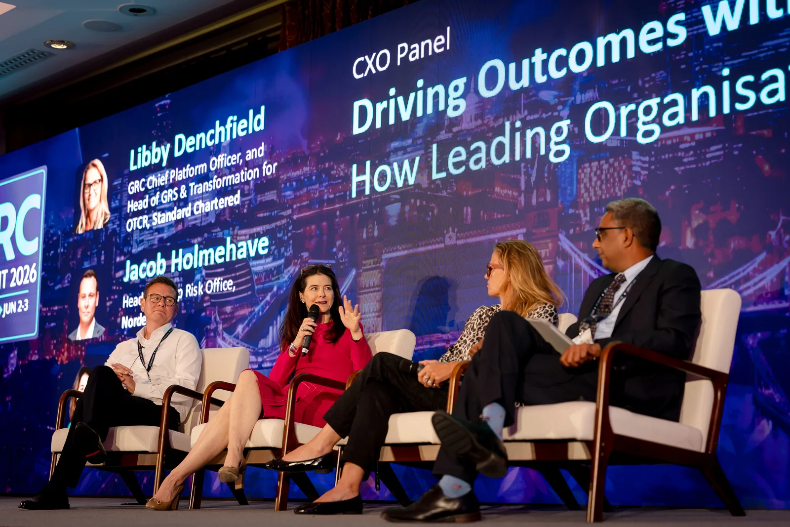 cxo-panel-discussion-stage-led-wall-grc-summit-2026
