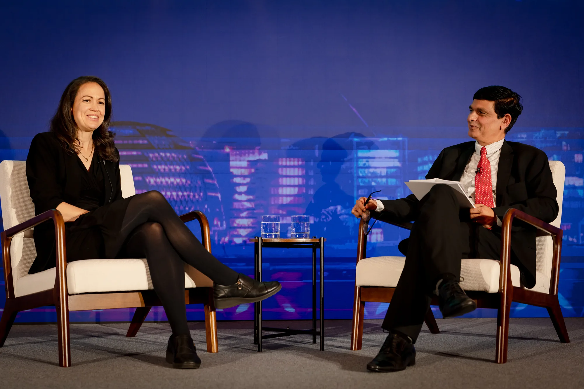 fireside-chat-armchairs-stage-set-grc-summit-2026