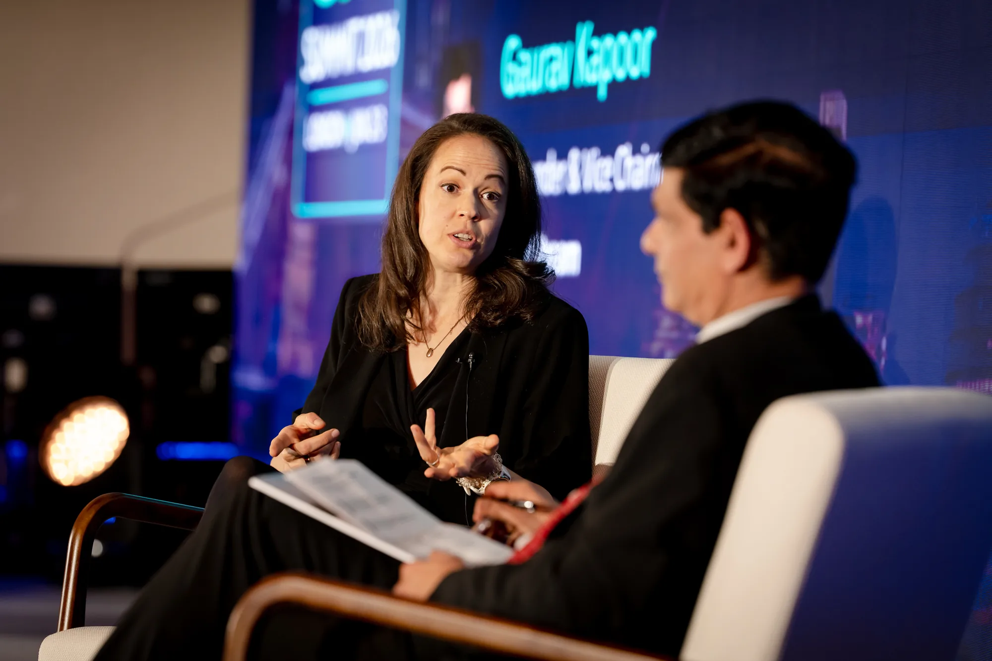fireside-chat-speakers-led-video-wall-grc-summit-london-2026