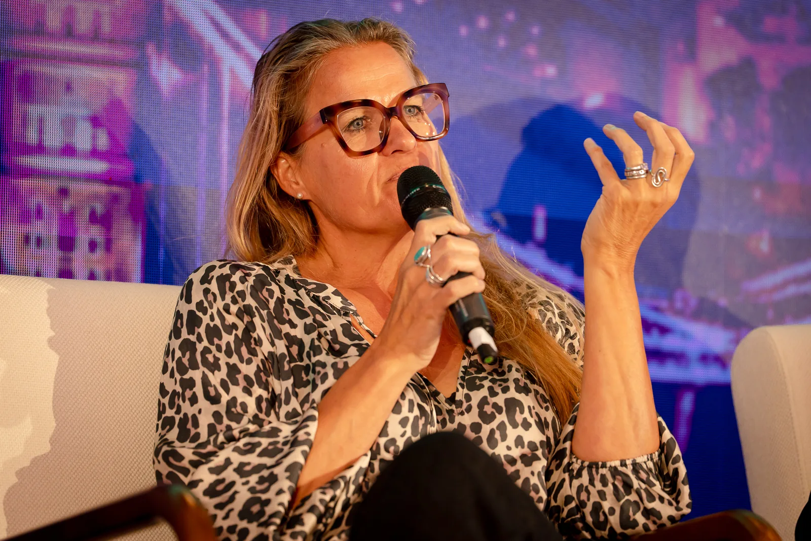 panelist-microphone-stage-led-wall-grc-summit-london-2026