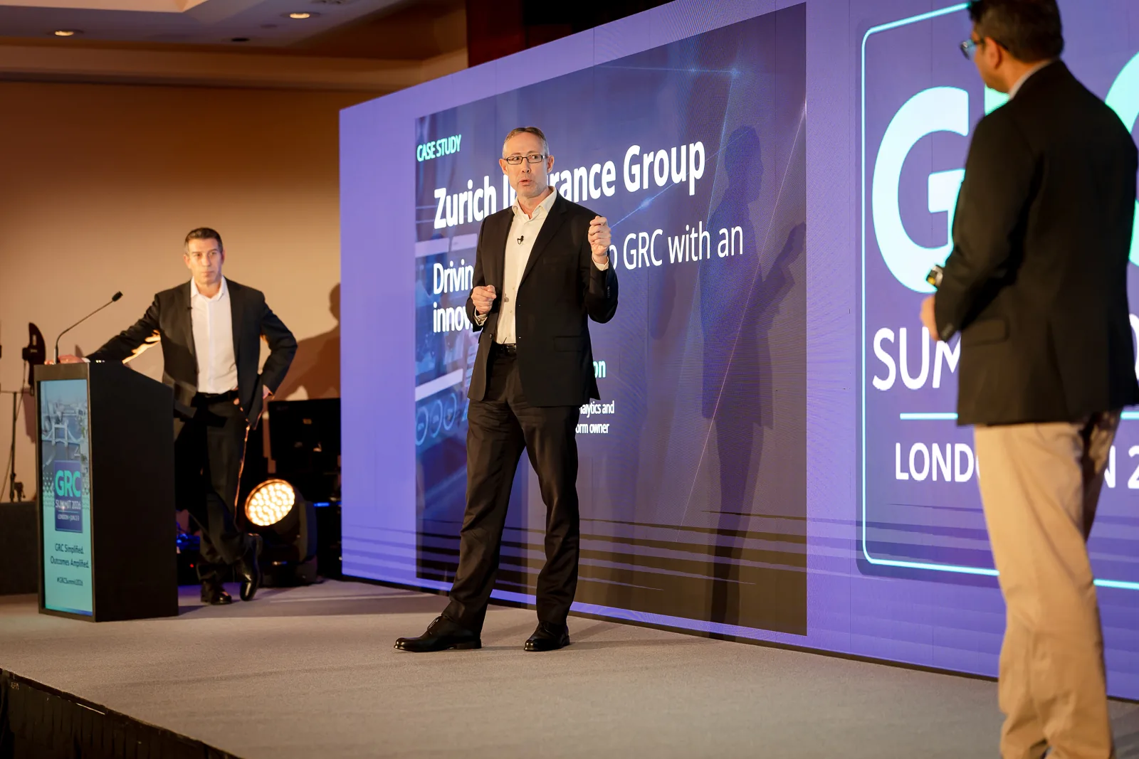 stage-set-lectern-led-video-wall-grc-summit-london-2026