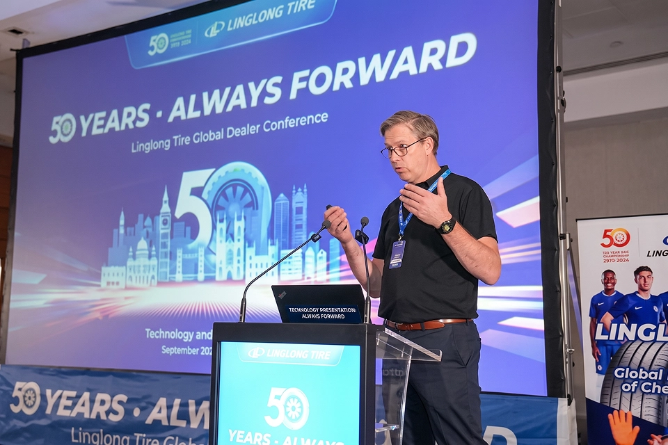 Speaker presenting at Linglong Tire Global Dealer_Conference London2025